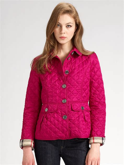 pink burberry quilted jacket.